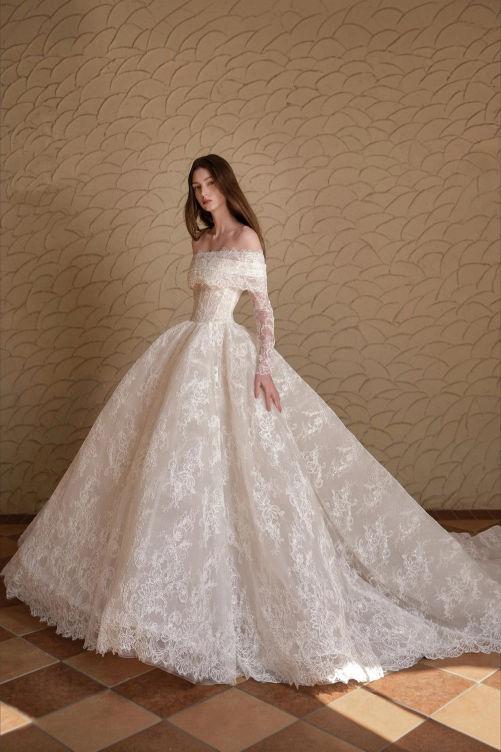 TheBlissWedding off-shoulder A-line bridal gown with intricate lace appliques and long sleeves in a vintage boho style.