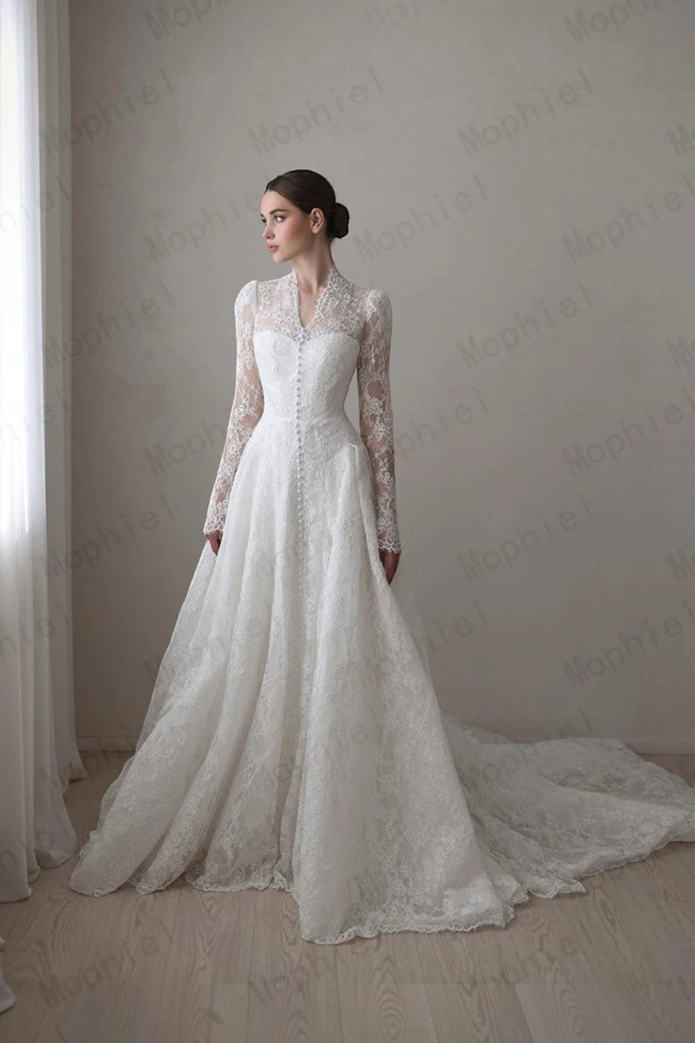 TheBlissWedding lace A-line bridal gown with high collar, long illusion sleeves, and a graceful sweep train.