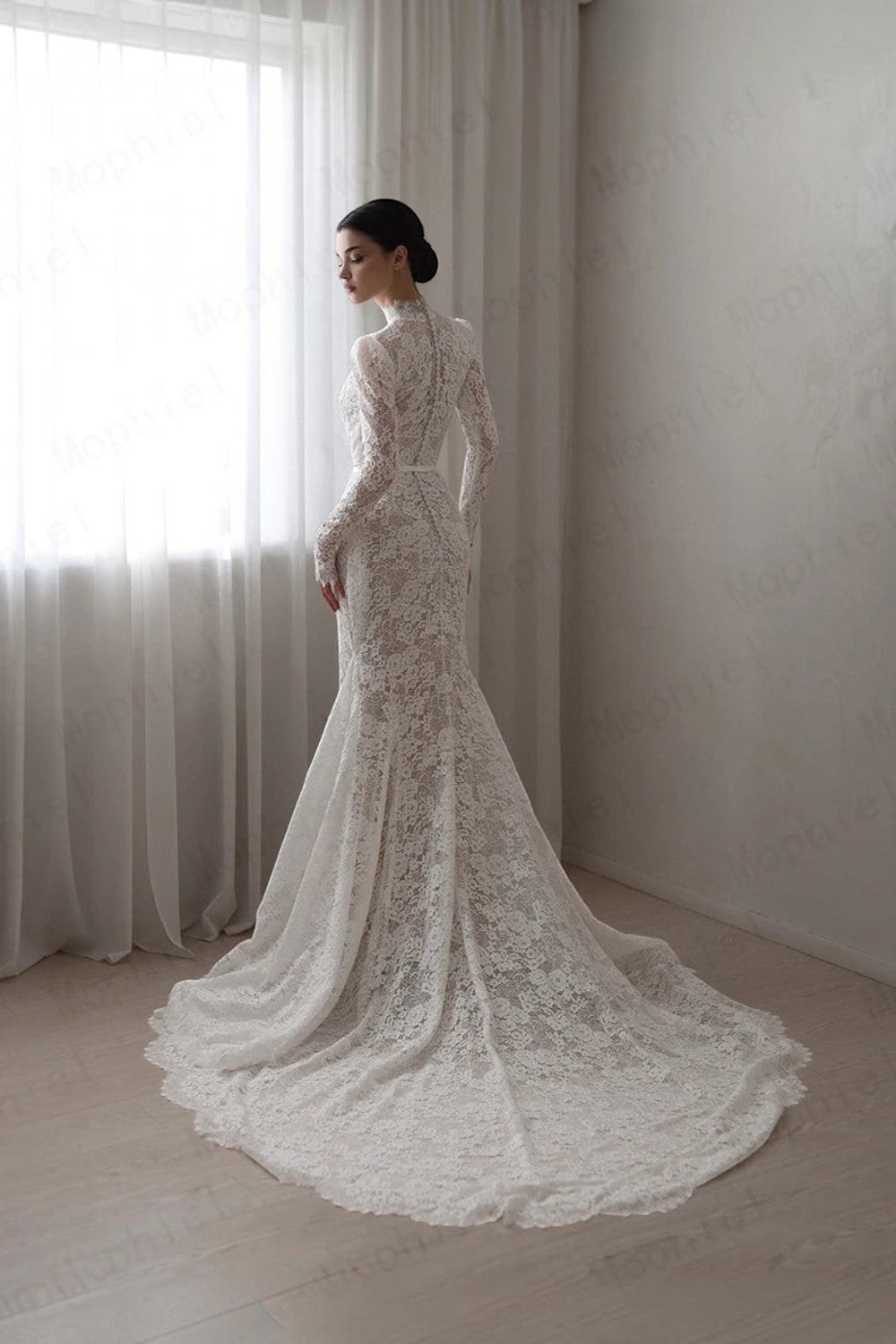 TheBlissWedding mermaid bridal gown with high neck, long lace sleeves, and a sweeping train in a classic white.