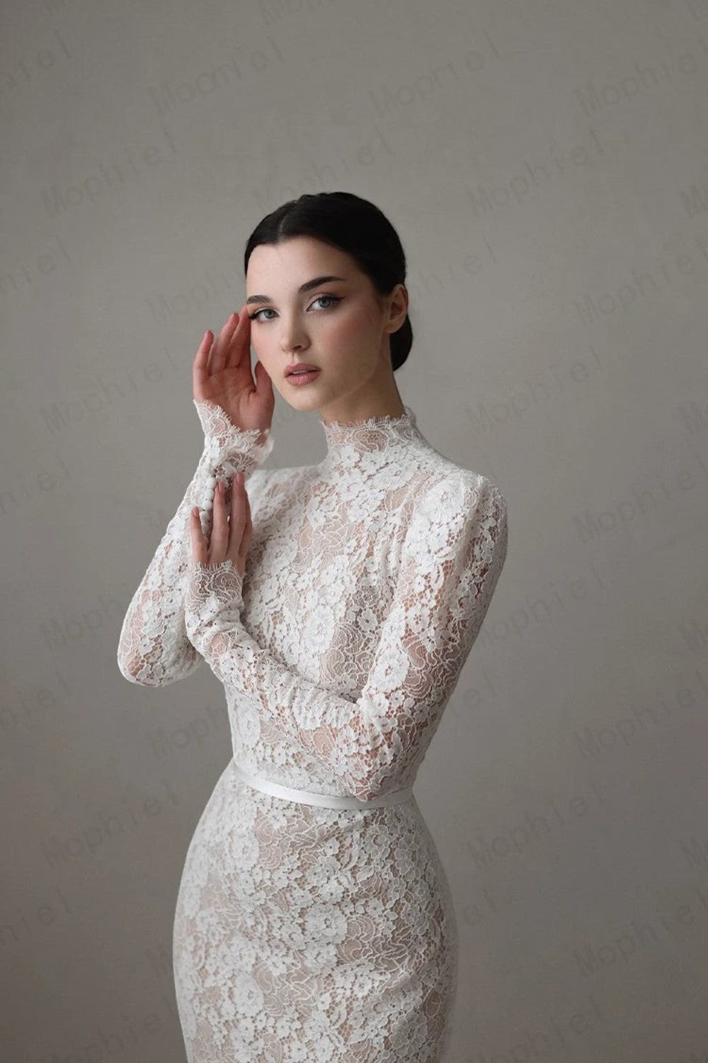 TheBlissWedding mermaid bridal gown with high neck, long lace sleeves, and intricate floral lace detailing.