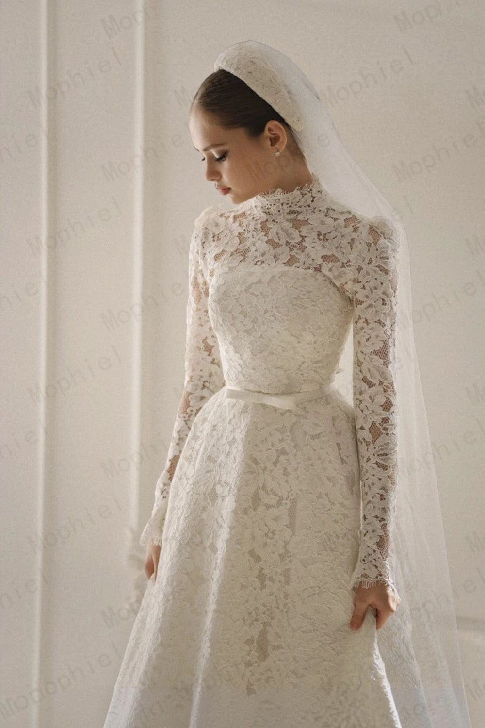 TheBlissWedding modest white lace wedding dress with high neck, long sleeves, and A-line silhouette with a veil