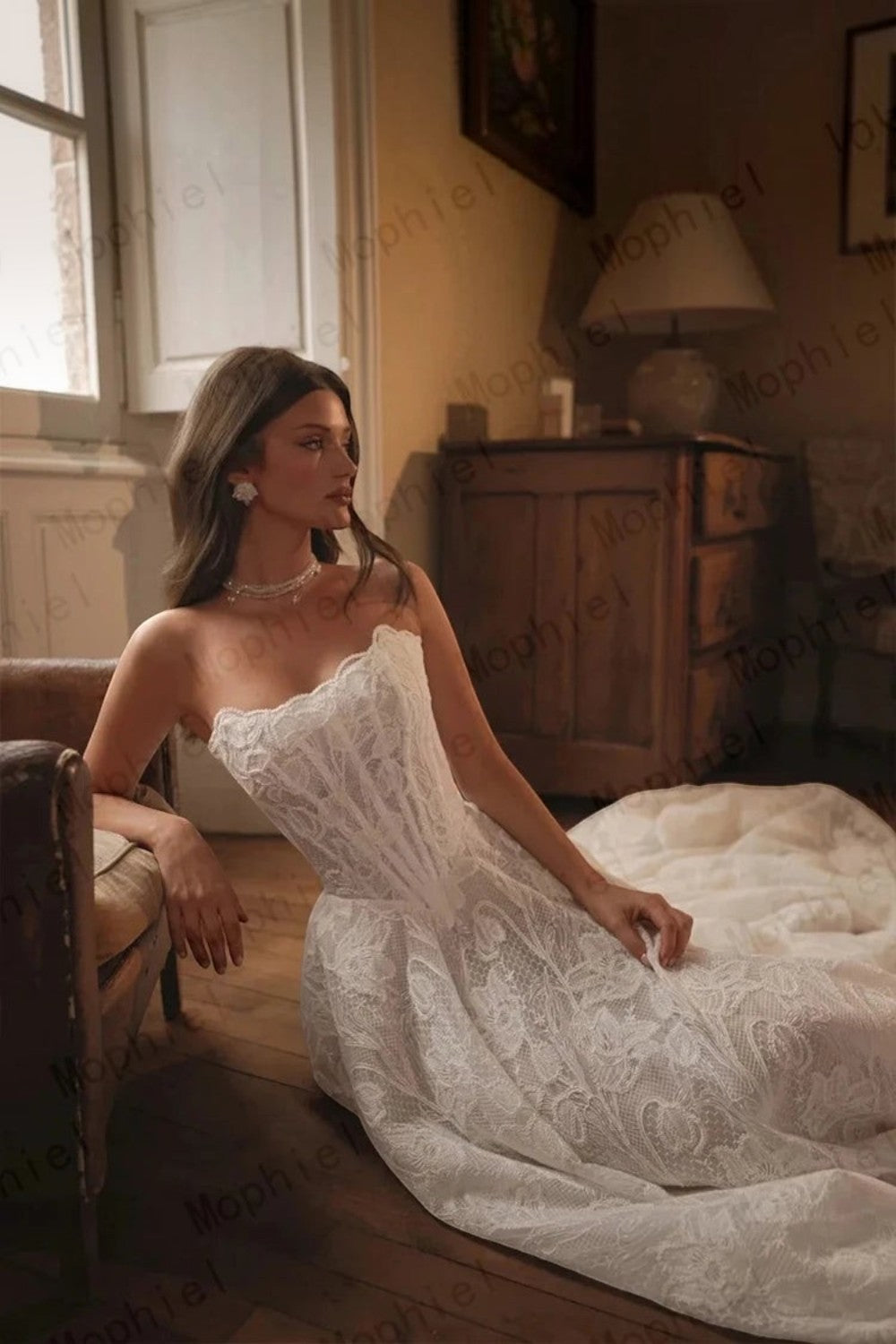TheBlissWedding off shoulder lace A-line bridal gown with intricate tatting detail and a romantic floor-length skirt.