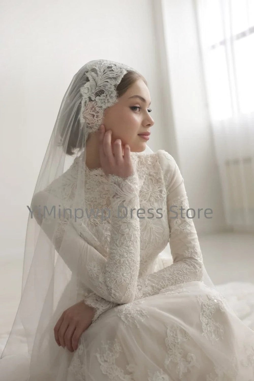 TheBlissWedding modest white wedding dress with high collar, long lace sleeves, and matching lace bridal veil