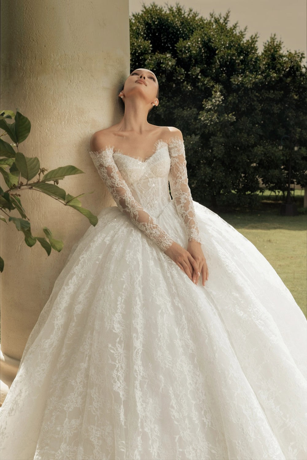 TheBlissWedding off shoulder lace wedding dress with long sleeves and a voluminous A-line princess skirt