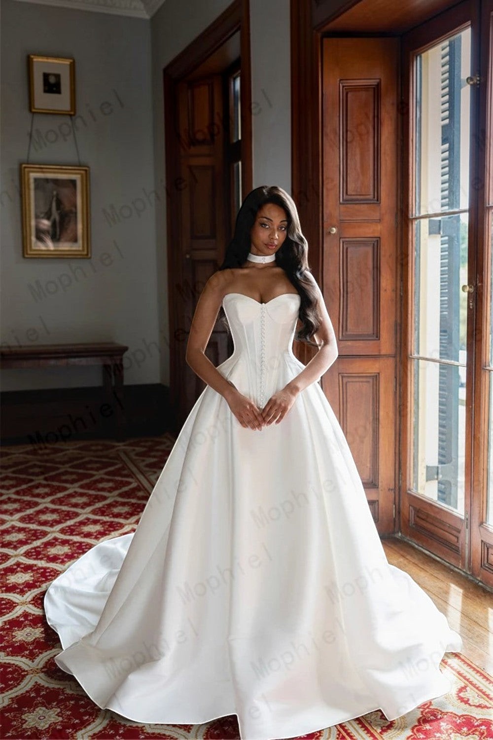 TheBlissWedding white satin A-line wedding dress with a sweetheart neckline and corset-style bodice in a classic room.