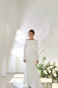 TheBlissWedding white satin mermaid wedding dress with off-shoulder neckline, long sleeves, and a detachable train.