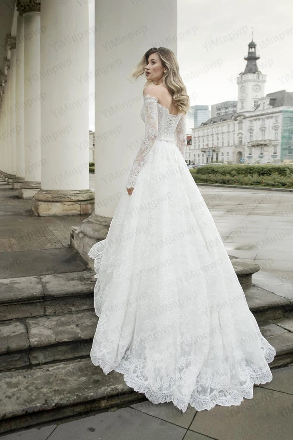 TheBlissWedding white lace A-line wedding dress with off-shoulder neckline, long sleeves, and a dramatic floor-length train