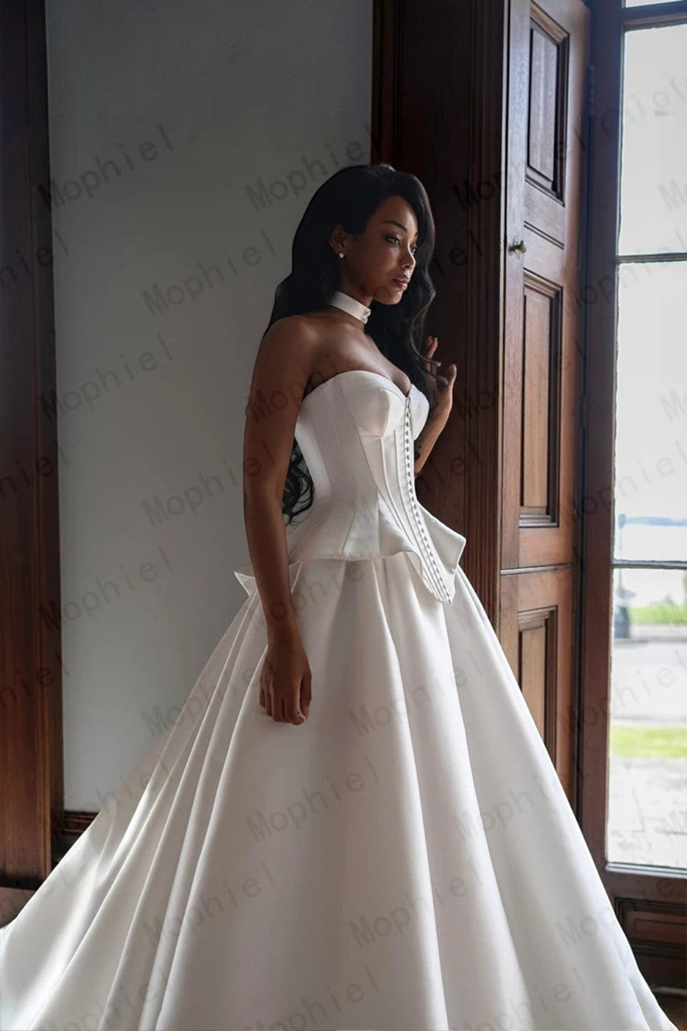 TheBlissWedding white satin A-line wedding dress with a sweetheart neckline and corset-style bodice on a model.